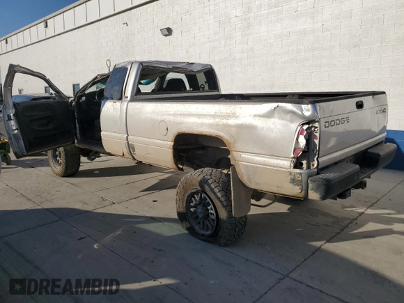 2001 Dodge Ram 2500 with VIN 1B7KF23661J595659, listed as a Copart auction lot 70756954 with 211,043 mi miles and Salvage Title. Bid and sale history available at carsss.com. Image 2.