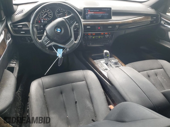 2017 BMW X5 xDrive35i z VIN 5UXKR0C50H0U53714, wystawiony jako Copart lot #57899365 z przebiegiem 124 846 mil mil oraz Szkoda całkowita • Salvage title. Historia ofert i sprzedaży dostępna na DreamBid. Obrazek 8.