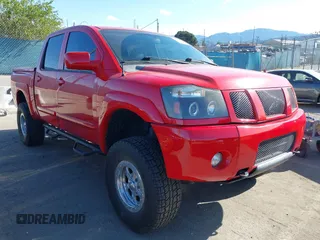 2006 Nissan Titan LE z VIN 1N6AA07B36N526947, wystawiony jako IAAI lot #41932691 z przebiegiem 167 256 mil mil oraz . Historia ofert i sprzedaży dostępna na DreamBid. Obrazek 1.