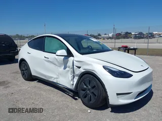 2025 Tesla Model Y Long Range with VIN 7SAYGDED6SF234278, listed as a IAAI auction lot 41781695 with 1,168 mi miles and . Bid and sale history available at DreamBid. Image 6.