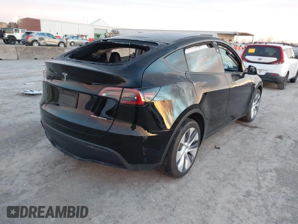 2023 Tesla Model Y Long Range z VIN 7SAYGDEE2PA166042, wystawiony jako IAAI lot #41348960 z przebiegiem Nie podano mil oraz . Historia ofert i sprzedaży dostępna na DreamBid. Obrazek 4.