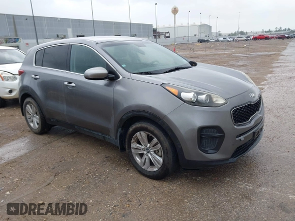 2017 Kia Sportage LX with VIN KNDPM3AC6H7233672, listed as a IAAI auction lot 42215738 with 130,112 mi miles and . Bid and sale history available at carsss.com. Image 1.