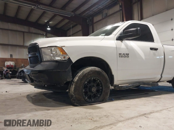 2014 Ram 1500 Express with VIN 3C6JR6AG7EG310097, listed as a IAAI auction lot 41409343 with 134,140 mi miles and . Bid and sale history available at DreamBid. Image 6.