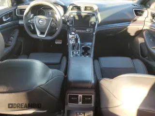 2023 Nissan Maxima SR with VIN 1N4AA6EV6PC513972, listed as a Copart auction lot 86695044 with 27,174 mi miles and Salvage title. Bid and sale history available at DreamBid. Image 8.