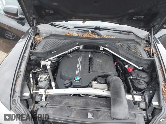 2014 BMW X6 xDrive35i z VIN 5UXFG2C56E0C45631, wystawiony jako IAAI lot #41967186 z przebiegiem 86 773 mil mil oraz . Historia ofert i sprzedaży dostępna na DreamBid. Obrazek 10.