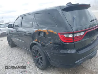 2021 Dodge Durango SRT Hellcat with VIN 1C4SDJH91MC682235, listed as a IAAI auction lot 42029380 with 9,921 mi miles and . Bid and sale history available at DreamBid. Image 14.