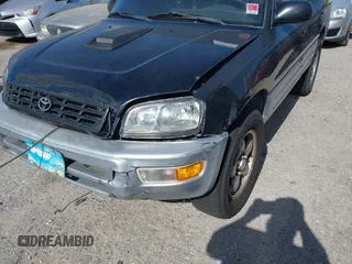 1998 Toyota RAV4 with VIN JT3GP10V7W7037711, listed as a IAAI auction lot 42081313 with 233,554 mi miles and . Bid and sale history available at DreamBid. Image 6.