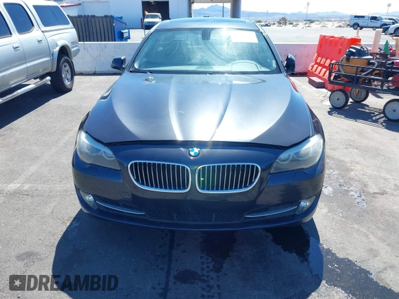 2013 BMW 5 Series 528i with VIN WBAXG5C58DD232582, listed as a IAAI auction lot 41890082 with 150,401 mi miles and . Bid and sale history available at carsss.com. Image 6.