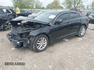 2013 Kia Optima LX z VIN 5XXGM4A71DG237574, wystawiony jako IAAI lot #42128874 z przebiegiem 127 114 mil mil oraz . Historia ofert i sprzedaży dostępna na DreamBid. Obrazek 17.