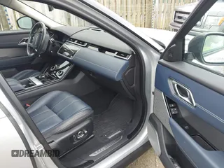 2018 Land Rover Range Rover Velar R-Dynamic HSE z VIN SALYM2RV0JA742422, wystawiony jako IAAI lot #42168647 z przebiegiem 65 298 mil mil oraz . Historia ofert i sprzedaży dostępna na DreamBid. Obrazek 5.