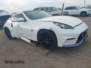 2012 Nissan 370Z z VIN JN1AZ4EH7CM561120, wystawiony jako IAAI lot #42280688 z przebiegiem 149 085 mil mil oraz . Historia ofert i sprzedaży dostępna na DreamBid. Obrazek 1.