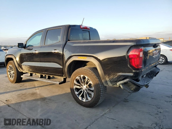 2023 GMC Canyon 4WD Denali with VIN 1GTP6FEK8P1164692, listed as a Copart auction lot 77033234 with 5,644 mi miles and Salvage Title. Bid and sale history available at carsss.com. Image 2.