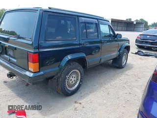 1995 Jeep Cherokee with VIN 1J4FN78S1SL640692, listed as a IAAI auction lot 42577079 with 232,087 mi miles and . Bid and sale history available at DreamBid. Image 4.