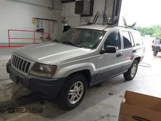 2004 Jeep Grand Cherokee Laredo with VIN 1J4GW48S44C161864, listed as a IAAI auction lot 42764536 with 143,833 mi miles and . Bid and sale history available at DreamBid. Image 2.