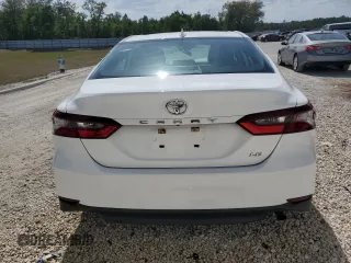2023 Toyota Camry LE z VIN 4T1C11AK1PU770237, wystawiony jako Copart lot #55590655 z przebiegiem 50 980 mil mil oraz Szkoda całkowita • Salvage title. Historia ofert i sprzedaży dostępna na DreamBid. Obrazek 6.