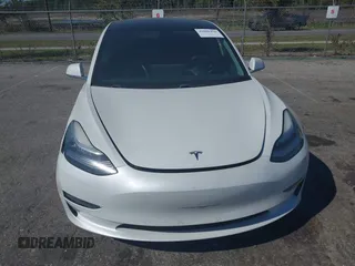 2019 Tesla Model 3 Mid Range with VIN 5YJ3E1EA7KF425127, listed as a IAAI auction lot 41886436 with 87,236 mi miles and . Bid and sale history available at carsss.com. Image 12.