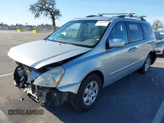 2009 Kia Sedona LX with VIN KNDMB233696303422, listed as a IAAI auction lot 41685934 with 148,746 mi miles. Bid and sale history available at carsss.com. Image 2.