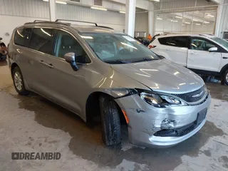 2021 Chrysler Voyager LXi with VIN 2C4RC1DG2MR506453, listed as a IAAI auction lot 41770938 with 90,255 mi miles and . Bid and sale history available at DreamBid. Image 1.