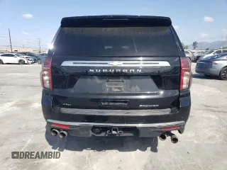 2023 Chevrolet Suburban Premier with VIN 1GNSKFKD8PR205665, listed as a Copart auction lot 51694655 with 27,882 mi miles and Salvage title. Bid and sale history available at DreamBid. Image 6.