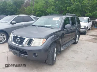 2012 Nissan Pathfinder SV z VIN 5N1AR1NN2CC626071, wystawiony jako IAAI lot #42122360 z przebiegiem 94 934 mil mil oraz . Historia ofert i sprzedaży dostępna na DreamBid. Obrazek 2.
