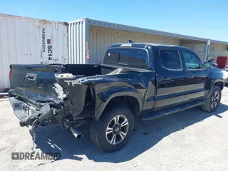 2018 Toyota Tacoma SR5 with VIN 3TMBZ5DN1JM014540, listed as a IAAI auction lot 42505324 with 112,990 mi miles and . Bid and sale history available at DreamBid. Image 4.