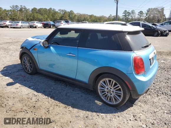 2015 MINI Hardtop with VIN WMWXM5C5XFT942679, listed as a Copart auction lot 49799655 with 79,072 mi miles and Salvage Title. Bid and sale history available at DreamBid. Image 2.