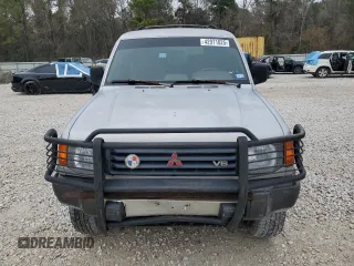 1995 Mitsubishi Montero z VIN JA4MR41H7SJ024208, wystawiony jako Copart lot #42971825 z przebiegiem 313 990 mil mil oraz Szkoda całkowita • Salvage title. Historia ofert i sprzedaży dostępna na DreamBid. Obrazek 5.