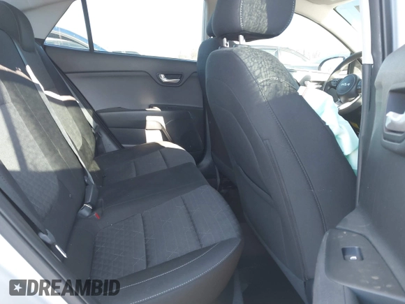 2023 Kia Rio LX with VIN 3KPA24ADXPE606463, listed as a IAAI auction lot 41728523 with 8,909 mi miles and . Bid and sale history available at DreamBid. Image 8.