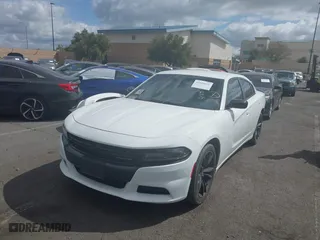 2018 Dodge Charger SXT with VIN 2C3CDXBG8JH297718, listed as a IAAI auction lot 41910526 with 63459 miles. Bid and sale history available at carsss.com. Image 19.