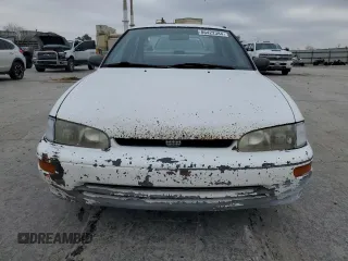 1997 Geo Prizm z VIN 1Y1SK526XVZ437486, wystawiony jako Copart lot #86422384 z przebiegiem 404 485 mil mil oraz Tytuł czysty. Historia ofert i sprzedaży dostępna na DreamBid. Obrazek 5.