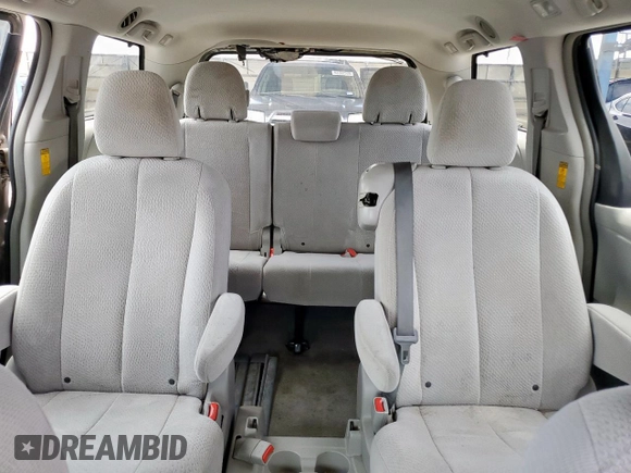 2014 Toyota Sienna LE AAS with VIN 5TDKK3DC4ES486440, listed as a Copart auction lot 62010355 with 401,453 mi miles and Salvage title. Bid and sale history available at DreamBid. Image 10.