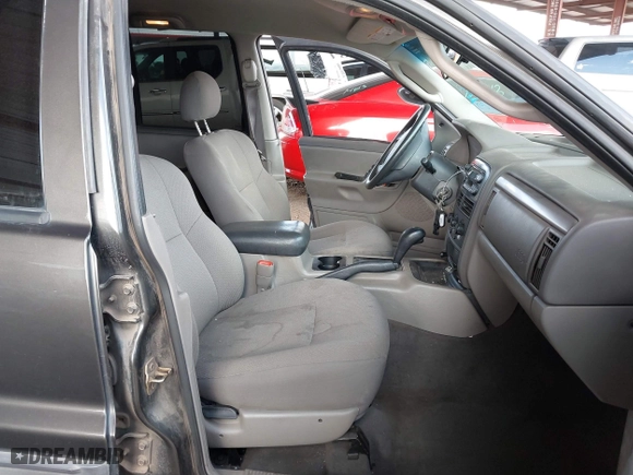 2004 Jeep Grand Cherokee Laredo with VIN 1J4GX48N64C436853, listed as a IAAI auction lot 41785918 with 118,578 mi miles. Bid and sale history available at carsss.com. Image 5.