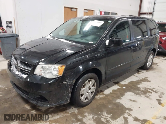 2012 Dodge Grand Caravan SE with VIN 2C4RDGBG8CR155758, listed as a IAAI auction lot 41300951 with 126,209 mi miles and . Bid and sale history available at DreamBid. Image 2.