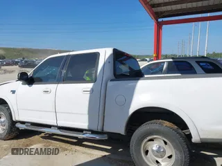 2003 Ford F-150 XLT with VIN 1FTRW08L63KA28964, listed as a IAAI auction lot 41689700 with 303,789 mi miles. Bid and sale history available at carsss.com. Image 15.