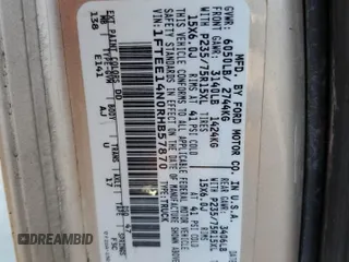 1994 Ford Econoline Cargo with VIN 1FTEE14N0RHB57870, listed as a Copart auction lot 52521055 with Not Provided miles and Salvage Title. Bid and sale history available at DreamBid. Image 14.