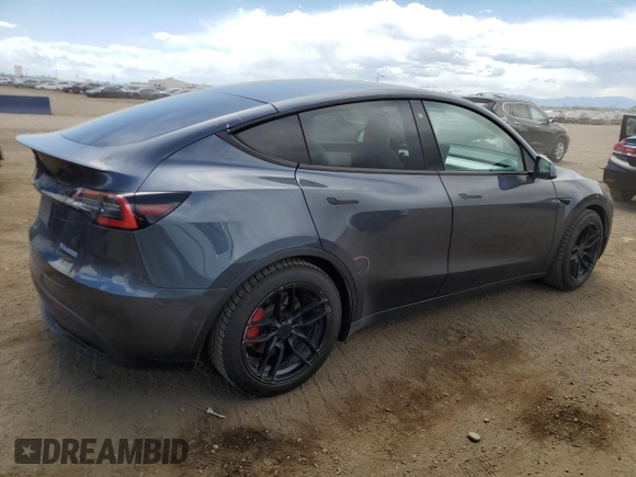 2021 Tesla Model Y Performance with VIN 5YJYGDEF0MF137692, listed as a Copart auction lot 55333395 with 56,325 mi miles and Salvage Title. Bid and sale history available at DreamBid. Image 3.