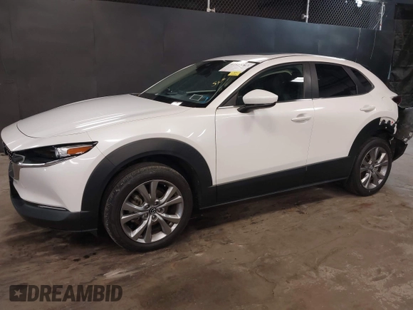 2021 Mazda CX-30 Preferred z VIN 3MVDMBCL2MM210902, wystawiony jako IAAI lot #42522203 z przebiegiem 42 995 mil mil oraz . Historia ofert i sprzedaży dostępna na DreamBid. Obrazek 19.