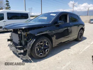 2024 BMW iX xDrive50 z VIN WB523CF05RCN96948, wystawiony jako Copart lot #50858304 z przebiegiem 8923 mil mil oraz Szkoda całkowita • Salvage title. Historia ofert i sprzedaży dostępna na DreamBid. Obrazek 1.