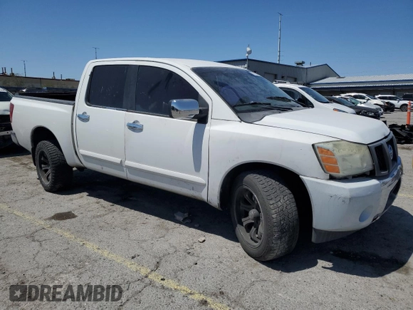 2004 Nissan Titan SE with VIN 1N6AA07A24N521744, listed as a Copart auction lot 58012925 with 268,270 mi miles and Salvage title. Bid and sale history available at DreamBid. Image 4.