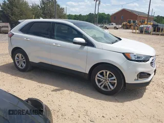 2020 Ford Edge SEL z VIN 2FMPK3J90LBA23025, wystawiony jako IAAI lot #42057424 z przebiegiem 47 119 mil mil oraz . Historia ofert i sprzedaży dostępna na DreamBid. Obrazek 1.
