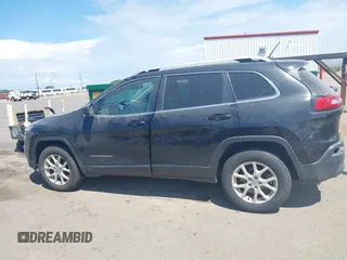 2015 Jeep Cherokee Latitude with VIN 1C4PJMCS3FW545440, listed as a IAAI auction lot 42268676 with 197,192 mi miles and . Bid and sale history available at DreamBid. Image 14.