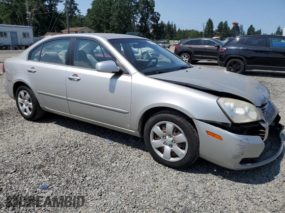 2008 Kia Optima LX z VIN KNAGE123185190108, wystawiony jako Copart lot #59364195 z przebiegiem 131 344 mil mil oraz Szkoda całkowita • Salvage title. Historia ofert i sprzedaży dostępna na DreamBid. Obrazek 4.