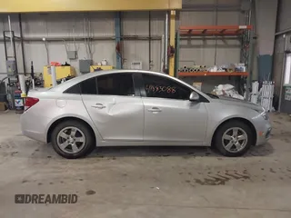 2015 Chevrolet Cruze LT with VIN 1G1PC5SB4F7132513, listed as a IAAI auction lot 41883088 with 131,185 mi miles and . Bid and sale history available at DreamBid. Image 14.