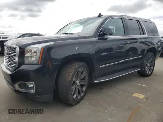 2020 GMC Yukon Denali with VIN 1GKS2CKJ5LR138566, listed as a Copart auction lot 74911634 with 0 mi miles and Salvage Title. Bid and sale history available at carsss.com. Image 1.