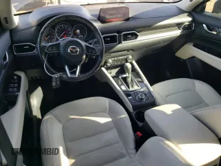 2018 Mazda CX-5 Grand Touring with VIN JM3KFADMXJ1323646, listed as a Copart auction lot 46857825 with 62,262 mi miles and Salvage title. Bid and sale history available at DreamBid. Image 8.