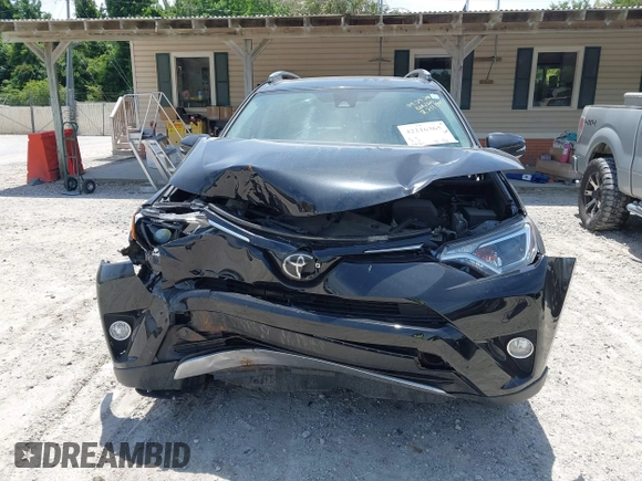 2018 Toyota RAV4 XLE z VIN 2T3WFREVXJW491725, wystawiony jako IAAI lot #42216365 z przebiegiem 76 365 mil mil oraz . Historia ofert i sprzedaży dostępna na DreamBid. Obrazek 12.