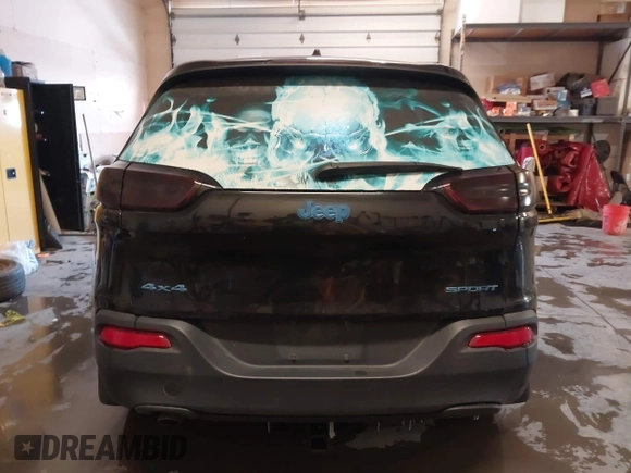 2015 Jeep Cherokee Sport with VIN 1C4PJMAB6FW773953, listed as a IAAI auction lot 41565879 with 242,580 mi miles. Bid and sale history available at carsss.com. Image 16.