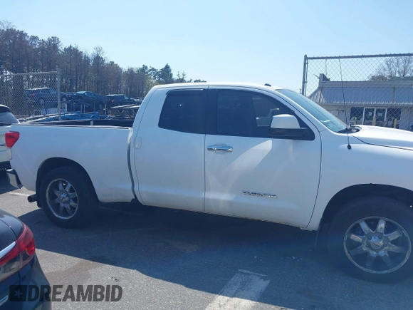 2011 Toyota Tundra 4WD Truck with VIN 5TFUM5F15BX023822, listed as a IAAI auction lot 42125607 with 194,779 mi miles. Bid and sale history available at carsss.com. Image 13.