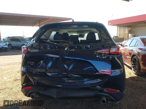 2023 Mazda CX-5 2.5 S Premium Plus Package with VIN JM3KFBEM3P0125736, listed as a IAAI auction lot 41578619 with 18,560 mi miles. Bid and sale history available at carsss.com. Image 16.
