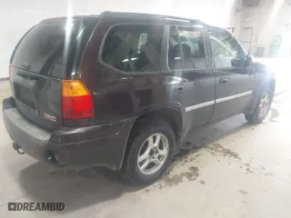 2008 GMC Envoy SLE2 with VIN 1GKDS13S682121604, listed as a IAAI auction lot 41613380 with 166,512 mi miles. Bid and sale history available at carsss.com. Image 4.